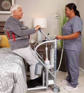 lot 24 image: MSRP $5000 Handicare MiniLift200 Patient Stander Sit to Stand Aid - Great Condition However Unable To Test As Battery Is Dead