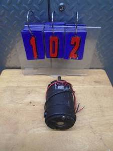 lot 102 image: Boehm 12 v dc motor. 12� shaft. Tested & works. As shown.