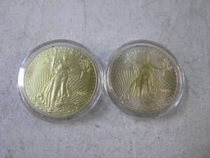 lot 11 image: (CNTR) 2 Replica 2019 1oz Gold $50 ...