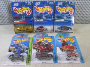 lot 303 image: (EC1) Assorted Hot Wheels in Packag...
