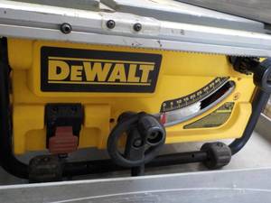lot 1 image: DeWalt Electric Saw...