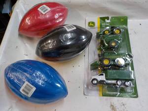 lot 63 image: John Deere Toys and Footballs...