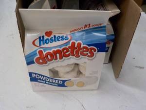 lot 164 image: 9 bags Hostess 10 oz Donettes past...