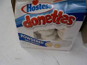 lot 167 image: 9 bags Hostess 10 oz Donettes past...
