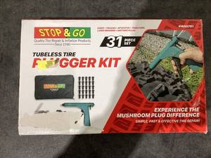 lot 642 image: Stop & Go Pocket Tire Plugger Kit
