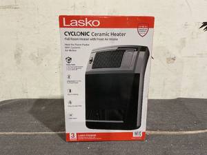 lot 217 image: Lasko 1500W Cyclonic Ceramic Console Electric Space Heater with Timer, CC24925, Black