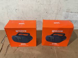 lot 318 image: LOT OF 2 Onn. Portable CD Boombox with Digital FM Radio