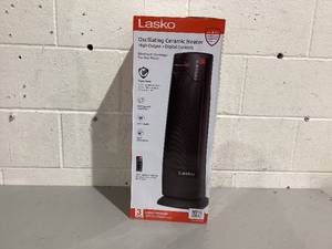 lot 587 image: Lasko 22 1500W Oscillating Ceramic Tower Space Heater with Remote