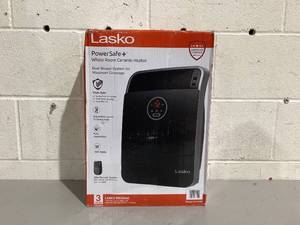 lot 583 image: Lasko 18 1500W Whole Room Ceramic Console Space Heater with Remote