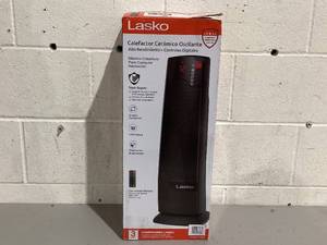 lot 594 image: Lasko 22 1500W Oscillating Ceramic Tower Space Heater with Remote