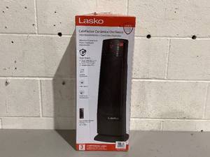 lot 725 image: Lasko 22 1500W Oscillating Ceramic Tower Space Heater with Remote