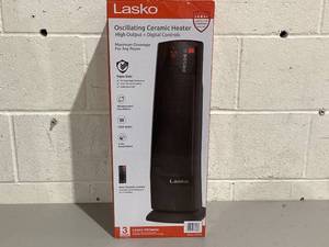 lot 586 image: Lasko 22 1500W Oscillating Ceramic Tower Space Heater with Remote
