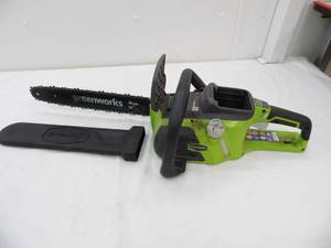 lot 203 image: Greenworks chainsaw