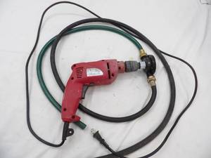 lot 209 image: Tool Shop Drill, pumping attachment