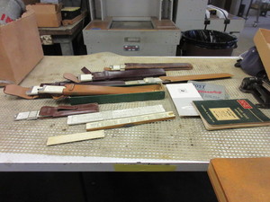 lot 638 image: VINTAGE SLIDE RULES WITH LEATHER CASES AND SLIDE RULE MANUALS