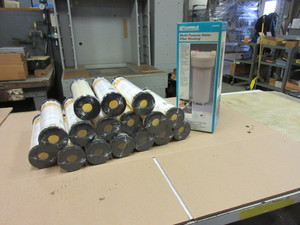 lot 727 image: KENMORE WATER FILTER HOUSING  AND SOME FILTERS - NEW