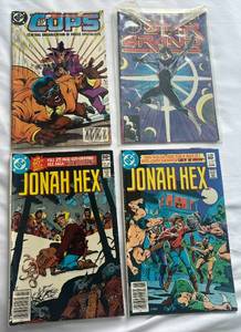 lot 99 image: (4) Comic Books - DC, Jonah Hex, Cops, Star Brand 1981-1989