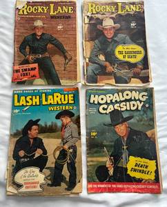 lot 92 image: (4) Vintage Western 10 Cent Comic Books 1952-53 Hopalong Cassidy, Lash LaRue, and Rocky Lane