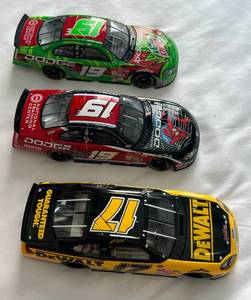 lot 112 image: (3) NASCAR Diecast Cars 124