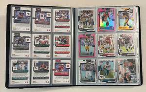 lot 52 image: 180 Card Binder - 2022 Football Cards - Absolute, Score, Mosaic, Playbook
