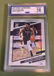 lot 8E image: Anthony Edwards Graded 10 Gem Mint 2021-22 Optic Silver Prizm Pulsar #83 Basketball Card