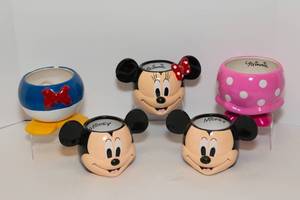 lot 27 image: Set of 5 Disney Character Ceramic Garden Planters  Mickey, Minnie, Donald Duck