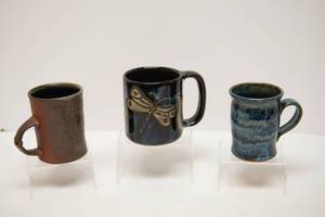 lot 63 image: Three Handmade Pottery Mugs