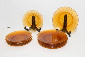 lot 75 image: Vintage Amber Colored Glass Plates and Soft Storage Container