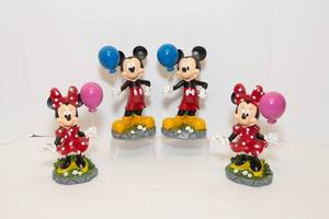 lot 94 image: Four Mickey Mouse and Minnie Mouse Figurines