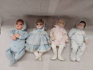 lot 39H image: Vintage Porcelain Baby Doll Set in Outfits