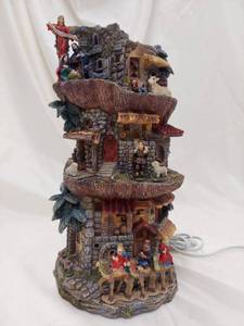 lot 29DA image: Jaimy Nativity Scene Lighted Christmas Tower - Some loose figures