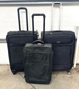 lot 160 image: Three Travel Bags  Suitcases  Roller Bags by Tumi, Samsonite and Kirkland