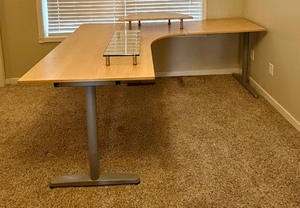 lot 22 image: IKEA Commercial L-Shaped Desk with Two Computer Workspace Risers