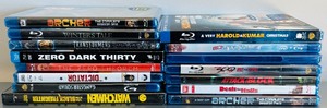 lot 324 image: 15 Unopened Blu-Ray And DVDs Including Archer, Transformers and More