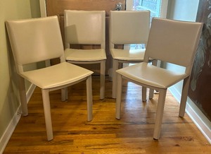 lot 285 image: Maria Yee Ink Four Cream Faux Leather Chairs