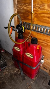 FLO-FAST Professional Model Pump, 2 Gasoline Containers 21 Gallons Total With Pump.