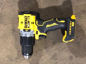 lot 31 image: DEWALT 20V Compact Cordless 12 in. Hammer Drill (Tool Only)   Customer Returns See Pictures