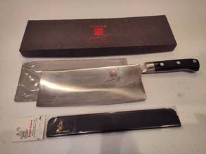 lot 36 image: MARTIN YANs Yan Can Cook Ultimate Chefs Knife wBox