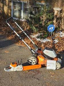 lot 202 image: Stihl 510 Electric Mower & 220C Chainsaw