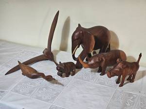 lot 62 image: MCM Afro Dcor Carved Safari Animals