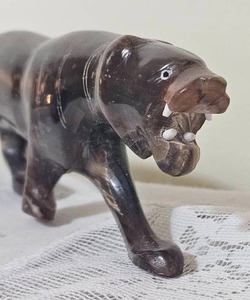 lot 64 image: Roaring Tiger Carved Horn Figure