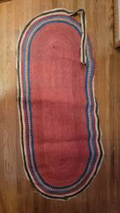 lot 30 image: African Woven Straw Oval Area Rug, as
