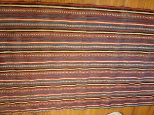 lot 29 image: African Woven Straw Area Rug, as