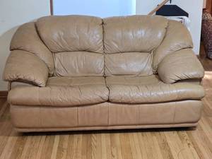 lot 311 image: Plush Beige Leather Loveseat