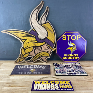 lot 96 image: Minnesota Vikings NFL Football Dcor, Minnesota Vikings 1996 Vintage Memorabilia, Vikings Country Stop Sign, Welcome To Our Home Wood Sign and Welcome Vikings Fans Wood Sign K