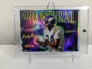 lot 31A image: 2000 Fleer Showcase Supernatural Randy Moss #1 T