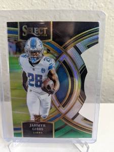lot 33A image: 2023 Panini Select Jahmyr Gibbs Premier Level Black and Green Die-Cut RC #198 T