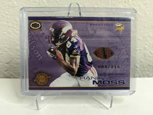 lot 59A image: 2001 Pacific Randy Moss Game Used Football Relic Numbered 088214 #13 T
