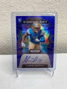 lot 875 image: 2024 Panini Prizm Draft Picks Gabriel Murphy Signing Day Blue Prizm Autograph RC #SD-GMY J