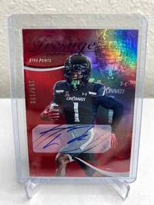 lot 105 image: 2023 Panini Prestige Tre Tucker Premium Red Signatures Autograph RC Numbered 158199 #379 J